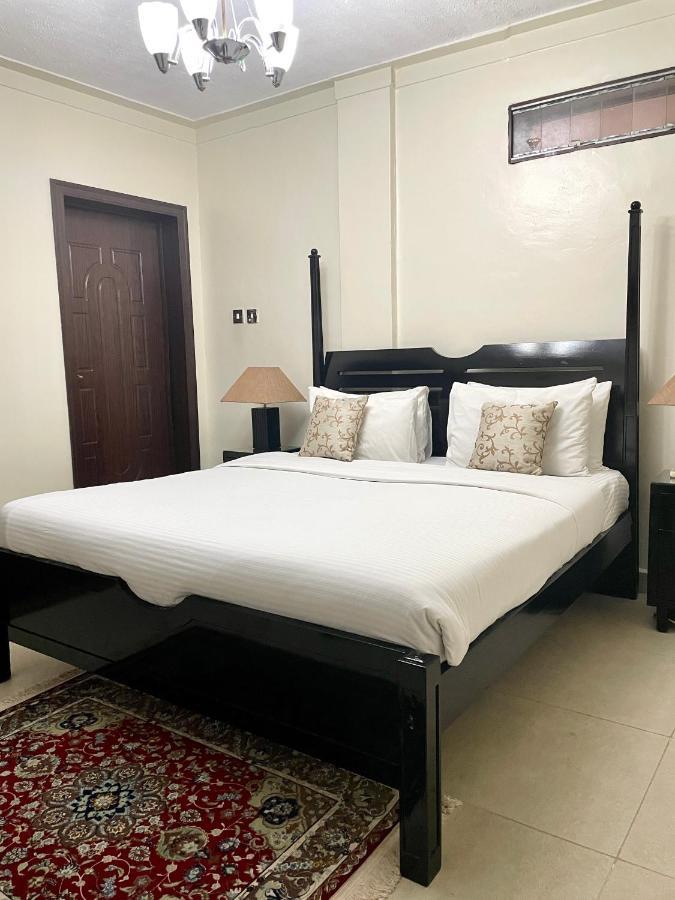 Mackinnon Suites Kampala Extérieur photo